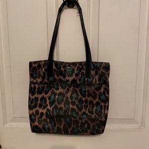 Coach bag slightly used printed brown & black color